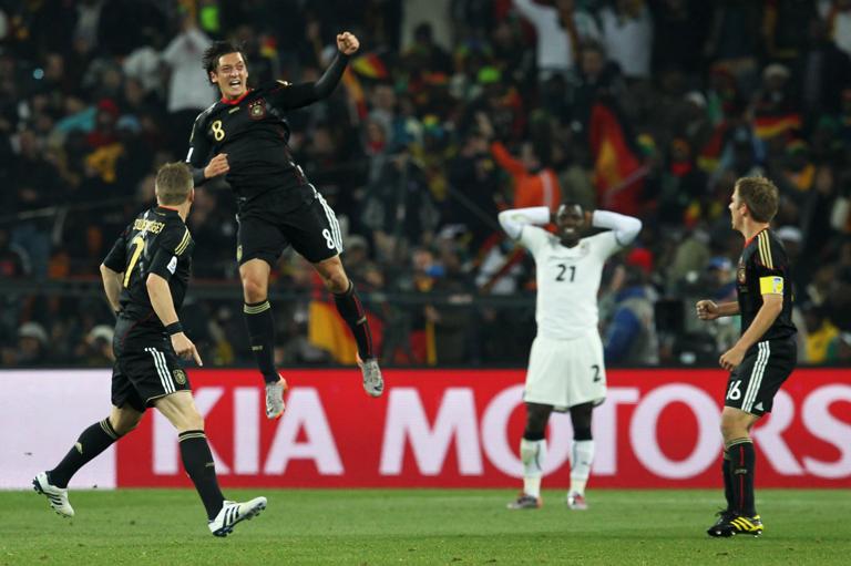 JOHANNESBURG, SOUTH AFRICA - JUNE 23:  Mesut Oezil (8) of Germany celebrates scoring during the 2010 FIFA World Cup South Africa Group D match between Ghana and Germany at Soccer City Stadium on June 23, 2010 in Johannesburg, South Africa.  (Photo by Jamie Squire - FIFA/FIFA via Getty Images)